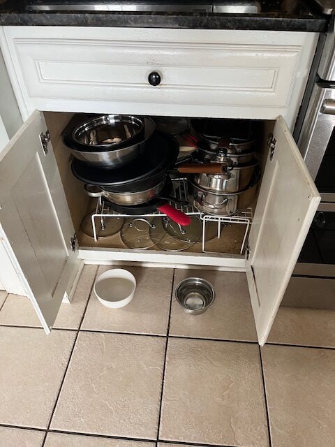 How to Organize Your Kitchen Cabinets - Kitchen Cupboard OrganizationClever Kitchen StorageKitchen Drawer OrganizationKitchen Cabinet OrganizationSmart KitchenCan OrganizerKitchen DrawersDrawer OrganizersPantry Cabinet